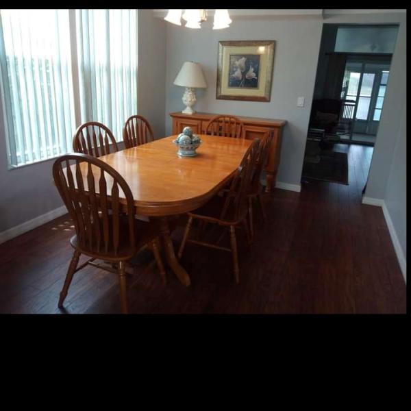 Photo of Beautiful extendable dining table with 6 chairs