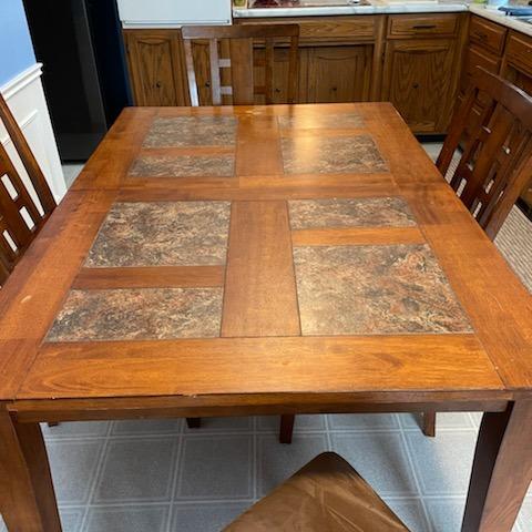 Photo of SOLD Dining table with tile inserts  with 4 chairs
