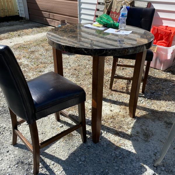 Photo of Table and Two Chairs