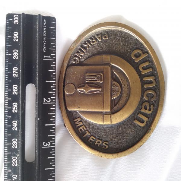 Photo of Vintage USA Duncan Parking Meter Coin Operated "Time Expired" Belt Buckle