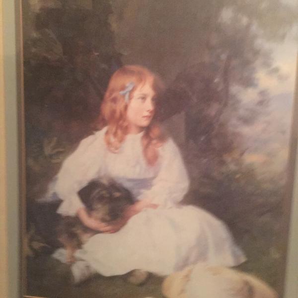 Photo of A  nicely mounted print of a girl & her dog