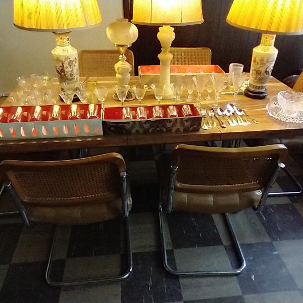 Photo of Dining table and 6 cane backed chairs.