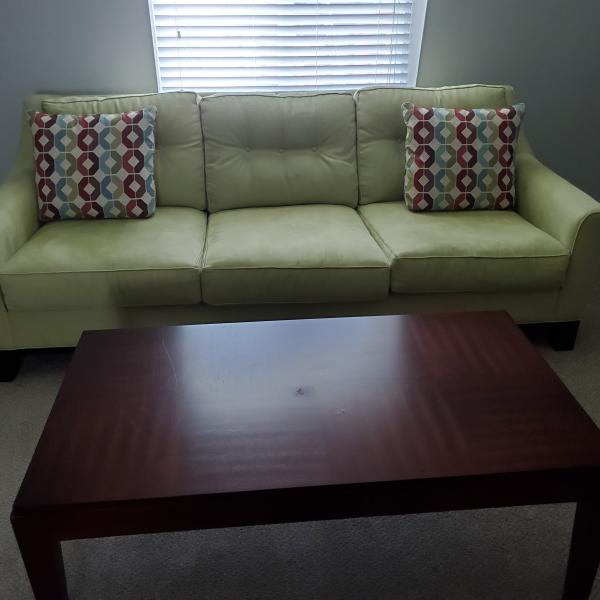 Photo of Queen Size Sofa, Light Green, with tables and armless chairs