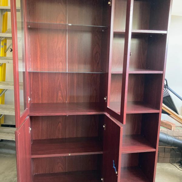 Photo of Glass door bookcase shelving unit