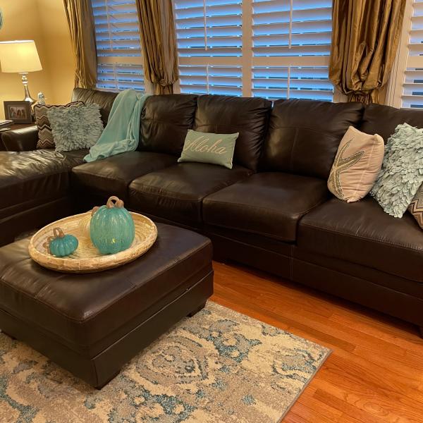 Photo of Leather couch and ottoman for sale