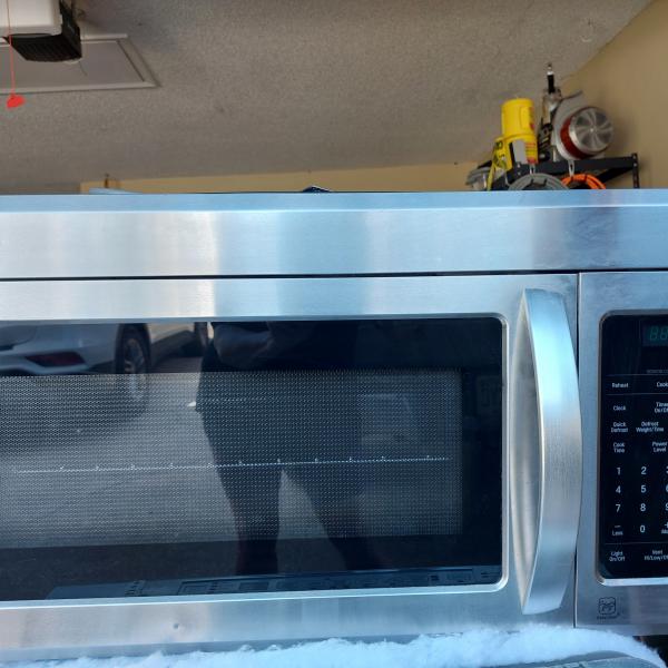 Photo of MICROWAVE MOUNTS ABOVE STOVE