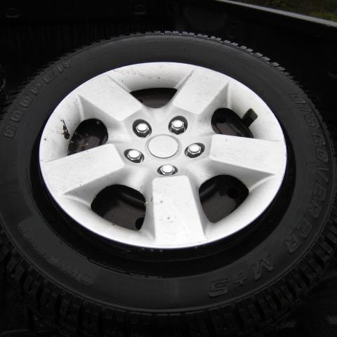 Photo of 4 cooper m/s studded winter tires