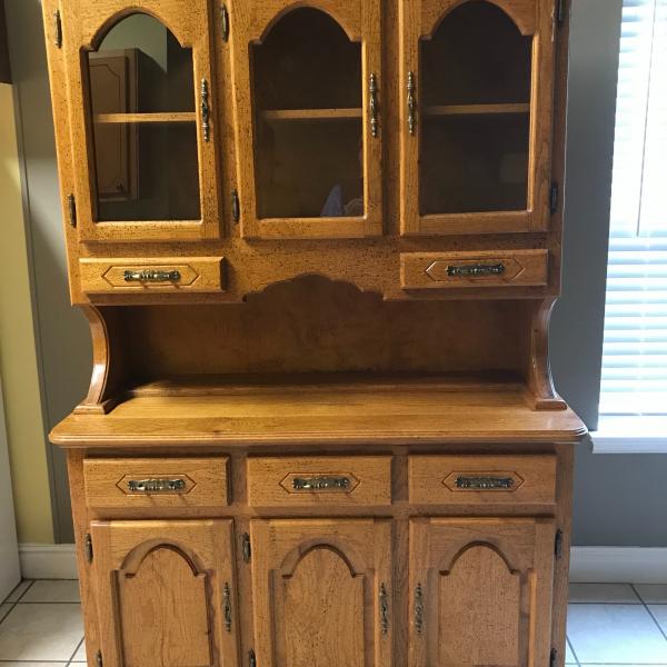Photo of China cabinet and tea cart