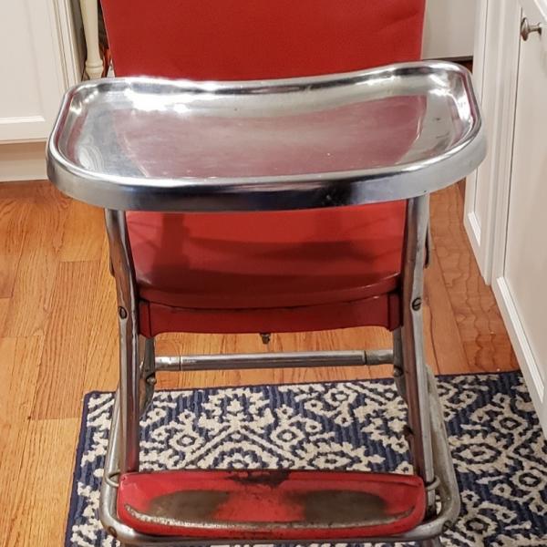 Photo of Antique Metal High Chair