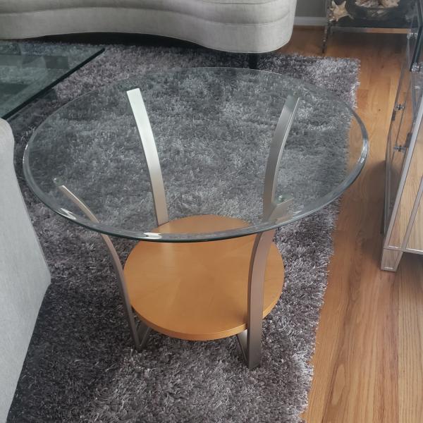 Photo of Glass topped lamp table