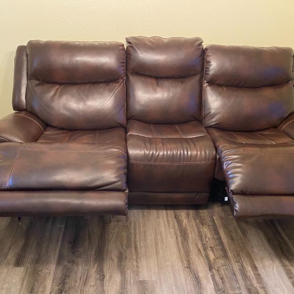 Photo of PU Leather reclining couch with USB ports 