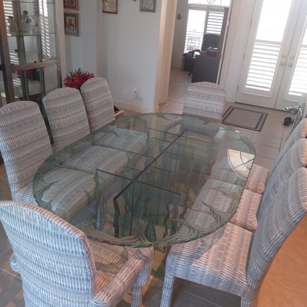 Photo of Glass Dining room table and Chairs