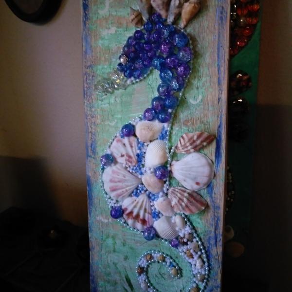 Photo of Handmade seahorse decor.  Vintage fighting roostets