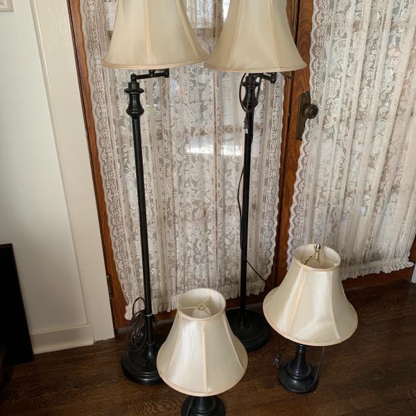 Photo of 4 lamps, 2 table lamps and 2 standing lamps 