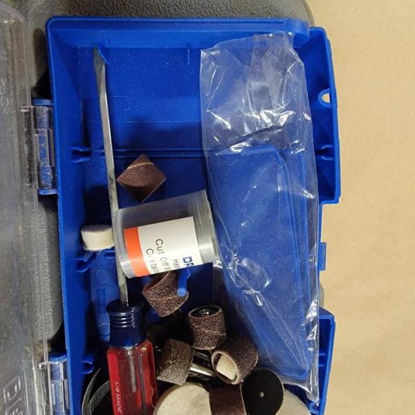 Photo of grey and blue dremel tool box 