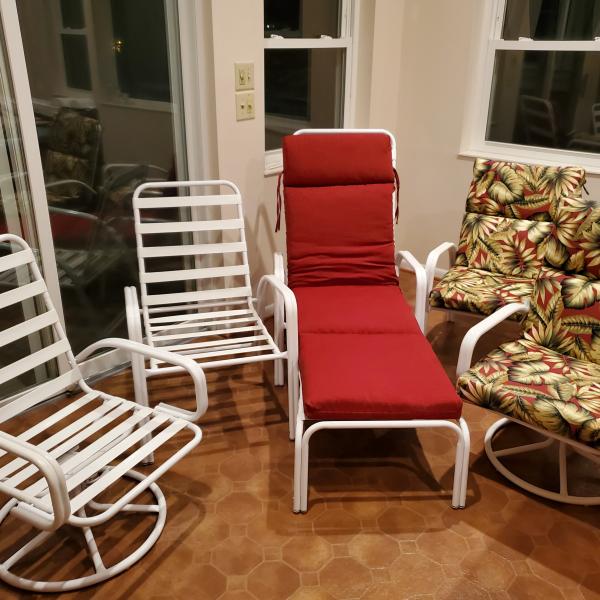 Photo of Patio table and 4 chairs and chaise lounge chair