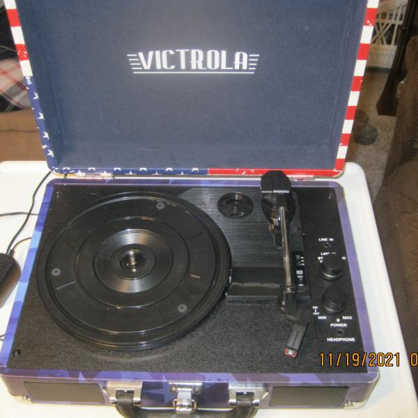 Photo of NEW VICTROLA SUITCASE RECORD PLAYER