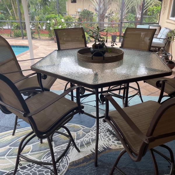 Photo of Patio table with six chairs 