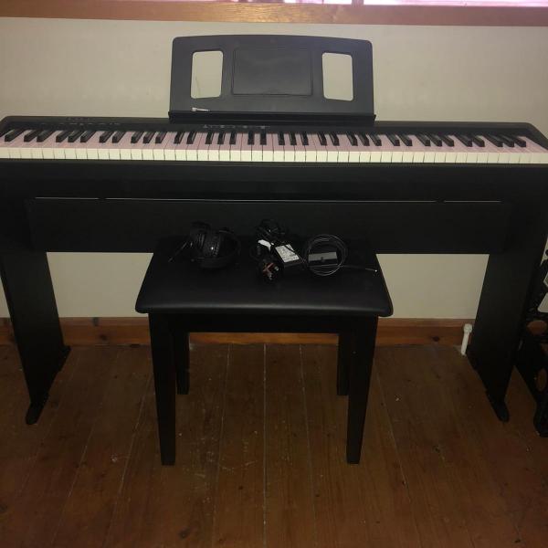 Photo of Roland FP 10 digital piano deluxe bundle