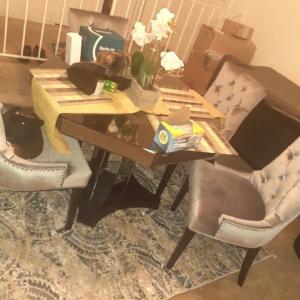 Photo of Glass dining table and 4 chairs 