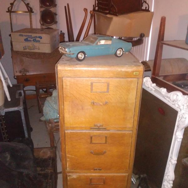 Photo of Wooden file cabinet $50