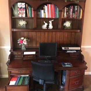 Photo of Large dark wood Desk and Chair