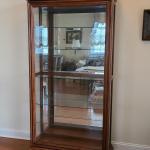 Lot 89: Pulaski Furniture Two Way Sliding Door Locking Curio Cabinet