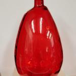 Large distinctive contemporary translucent red vase