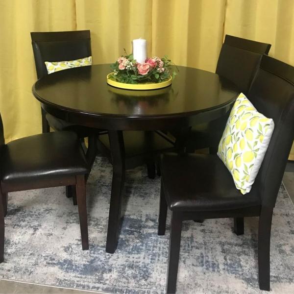 Photo of Beautiful dark Table and four Chairs