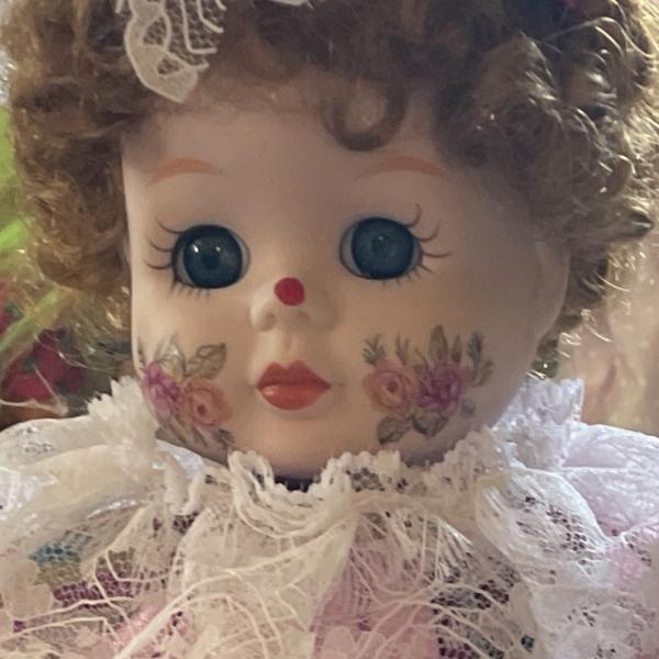 Photo of Musical Porcelain clown doll