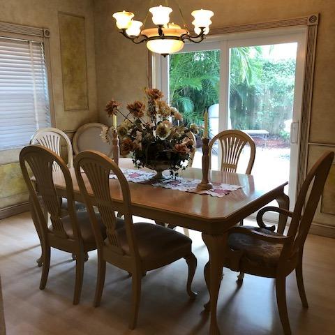Photo of Dining Room Table, 6 Chairs and china hutch