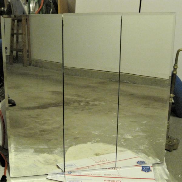 Photo of bathroom medicine cabinet 30 x 30 excellent cond.  beveled mirrors
