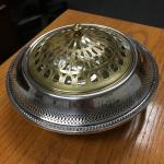 Silver pedestal dish with brass dome cover