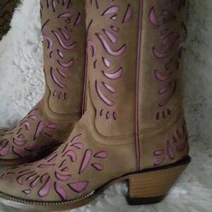 Photo of Boots, beautiful, for ladies or girls.