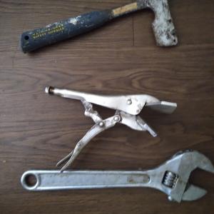 Photo of shingler hammer, crescent, duck bill clamp