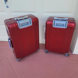 Photo of     RED METALIC SUIT CASES (PRICE INCLUDES BOTH)