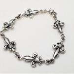 Lot #11  Classic Sterling Silver Fleur di Lis bracelet