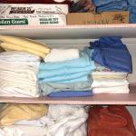 LOT 139  HALL LINEN CLOSET SHEETS TOWELS TABLE CLOTHS
