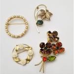 Lot #22    Lot of 4 vintage Brooches - Monet, Kenneth Lane, DCE