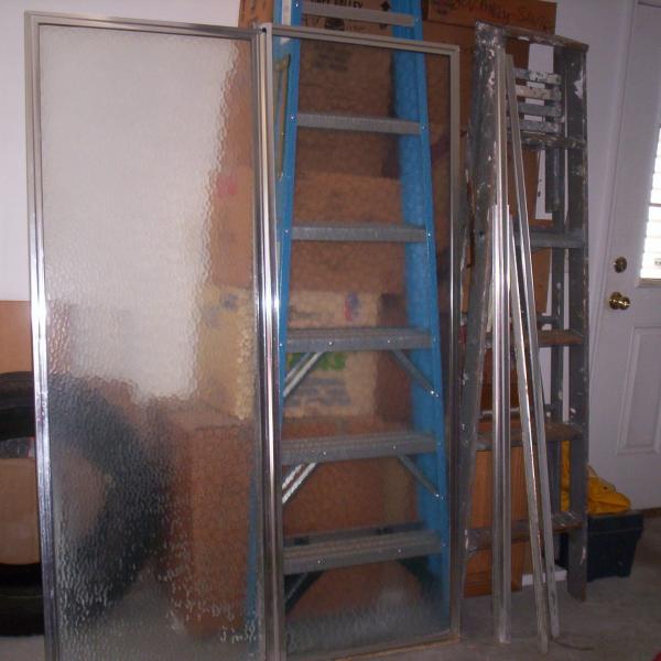 Photo of Glass shower door enclosure for shower stall .