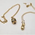Lot #26  Two Joan Rivers "Egg" necklaces - QVC