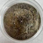 689  1935 Silver Peace Dollar w/ Small Toning