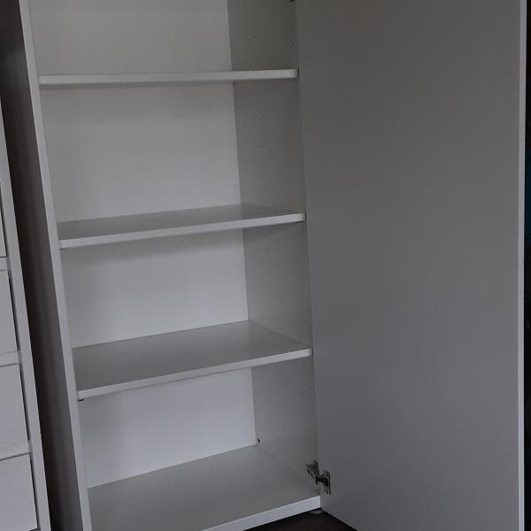 Photo of Adjustable 4 shelf white cabinet with door