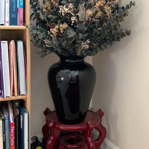 Photo of Black glass vase with eucalyptus
