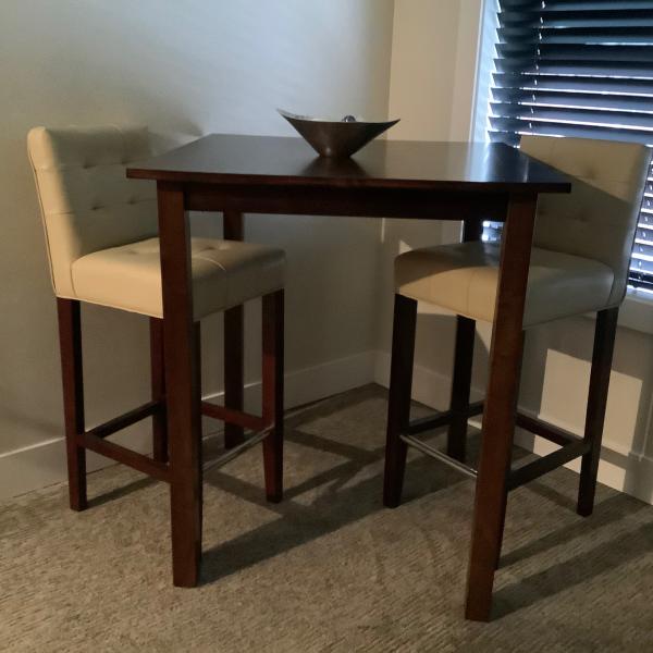 Photo of Cocktail Table and Leather Stools