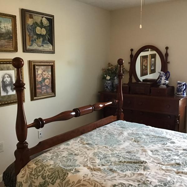 Photo of Queen bed and dresser
