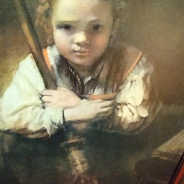 Photo of Large wood frame girl with broom