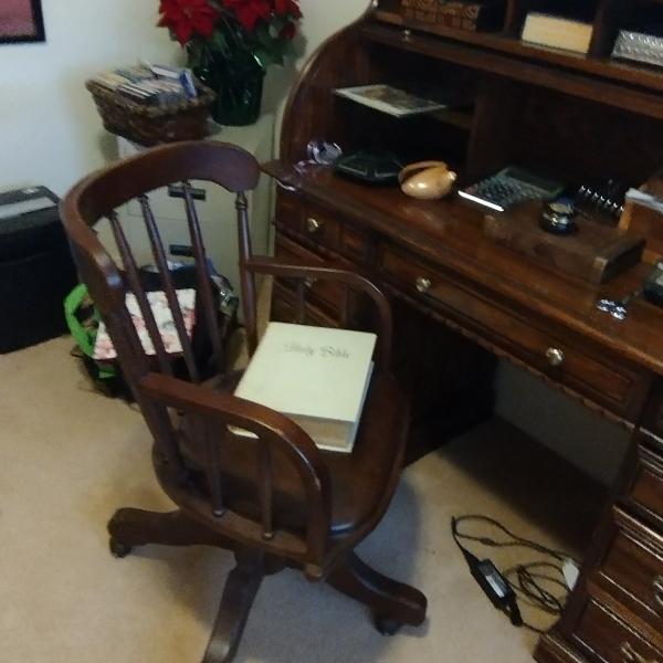 Photo of Roll top desk with chair