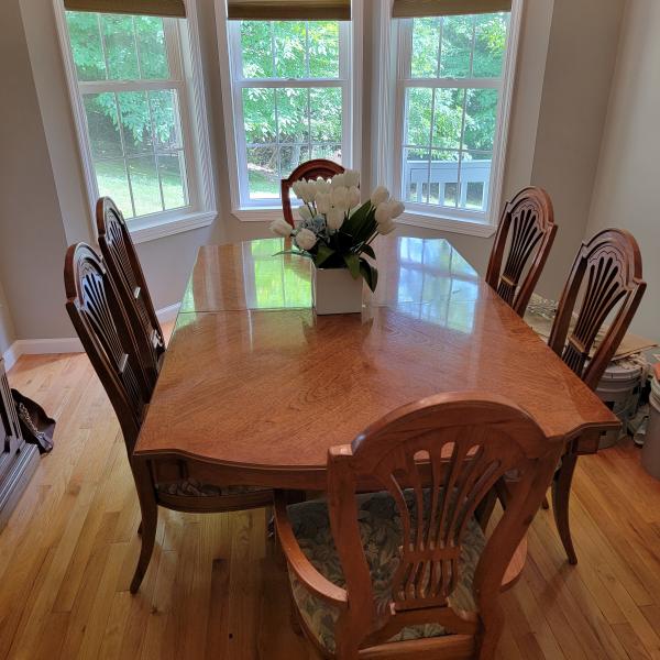 Photo of Dining room table and chairs
