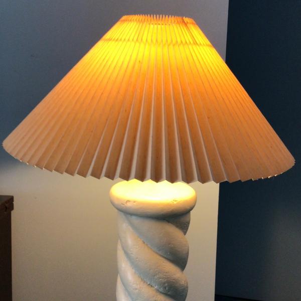 Photo of Terra Cotta floor lamp with shade.